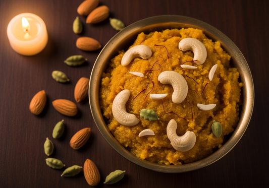 Badam halwa recipe — saffron almond halwa garnished with roasted cashews and kesar strands