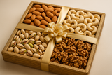 Generate an image of Dry Fruits Gift Tray containing Almonds, Cashews, Pistachios and Walnuts in equal proportion, with a 4 way ribbon and flower on top for decoration